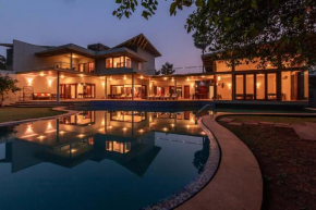 Jay House by StayVista - Leisure oasis with pool, snooker, table tennis & foosball fun